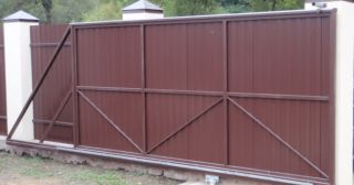 Купить откатные ворота из профнастила Томск, цена от 1736 руб.