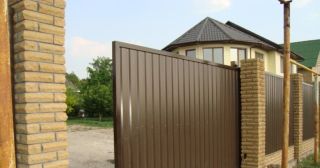 Купить откатные ворота из профнастила Томск, цена от 1736 руб.